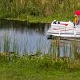 <p align=left>Sur le canal, des touristes, des pêcheurs...